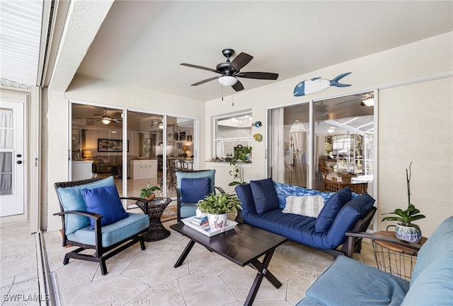 view of patio / terrace featuring an outdoor living space and ceiling fan