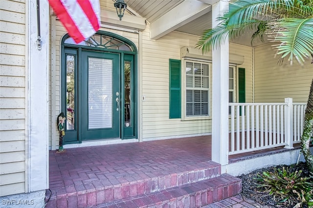 property entrance with a porch