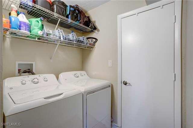 washroom with separate washer and dryer