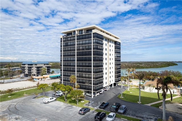 view of building exterior featuring a water view