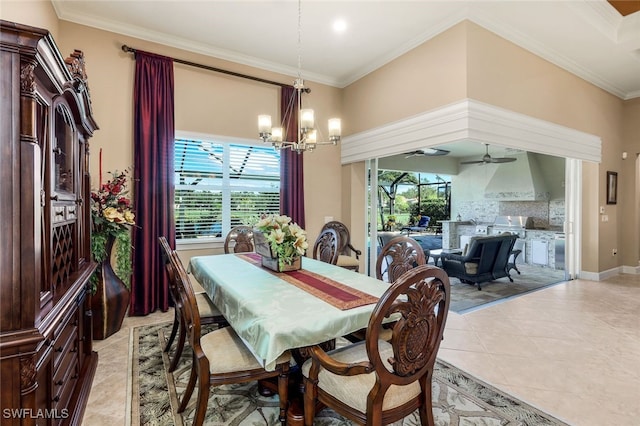 dining space featuring light tile patterned floors, ceiling fan with notable chandelier, and ornamental molding