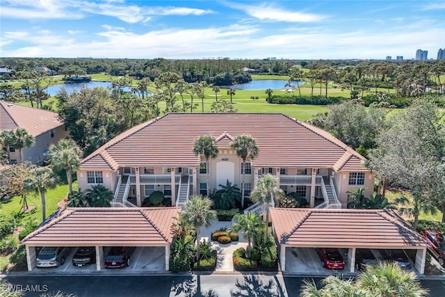 birds eye view of property featuring a water view