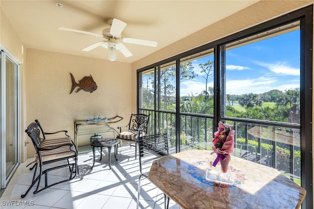 sunroom / solarium with ceiling fan