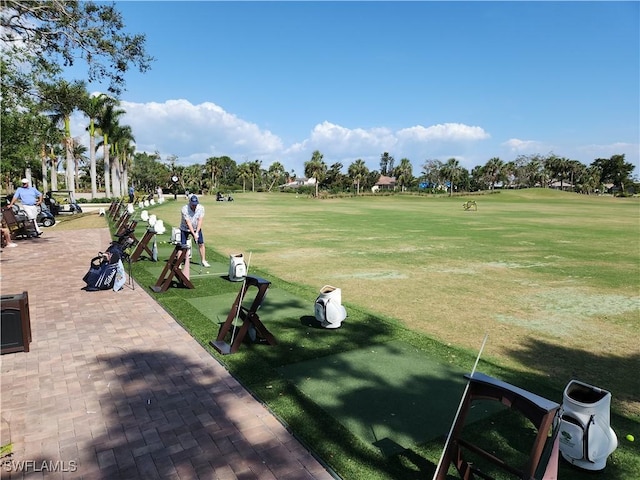 view of property's community featuring a lawn