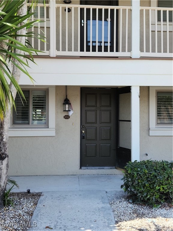 doorway to property with a balcony