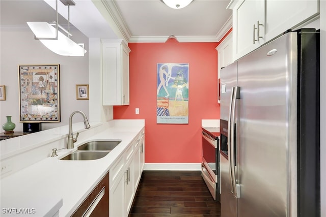 kitchen featuring sink, decorative light fixtures, ornamental molding, and stainless steel appliances