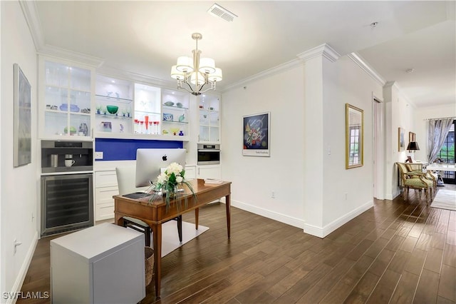 office area featuring wine cooler, a notable chandelier, crown molding, and dark wood-type flooring