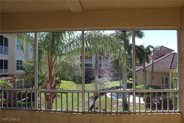 unfurnished sunroom with plenty of natural light