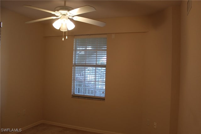 unfurnished room featuring ceiling fan