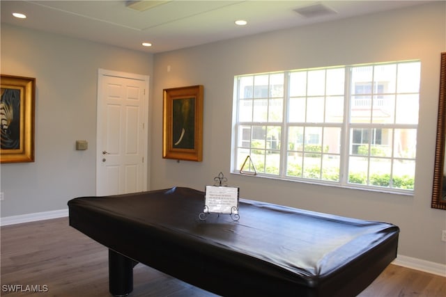 recreation room with hardwood / wood-style flooring, a healthy amount of sunlight, and billiards