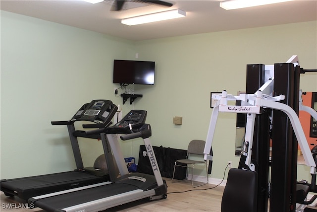 workout room with light wood-type flooring