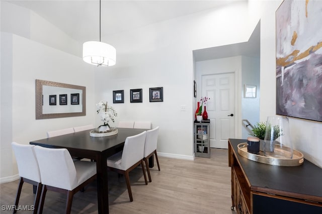 dining area with light wood-type flooring