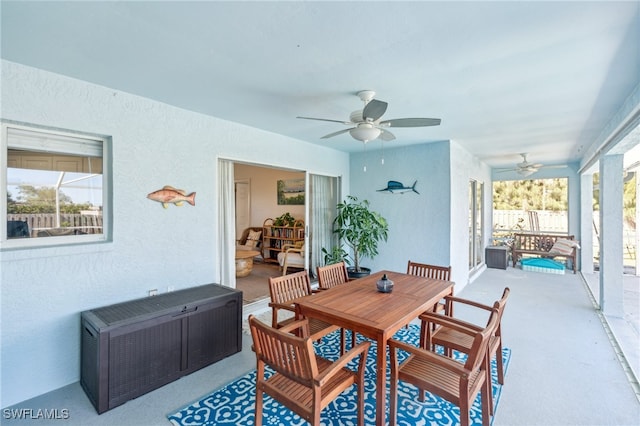 dining space featuring ceiling fan, plenty of natural light, and radiator