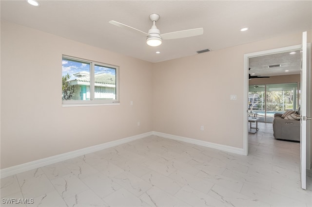 unfurnished room featuring ceiling fan