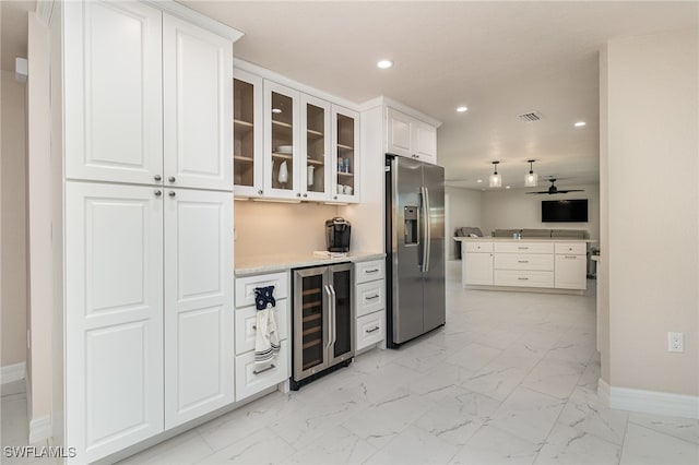 kitchen with white cabinets, stainless steel refrigerator with ice dispenser, wine cooler, and ceiling fan