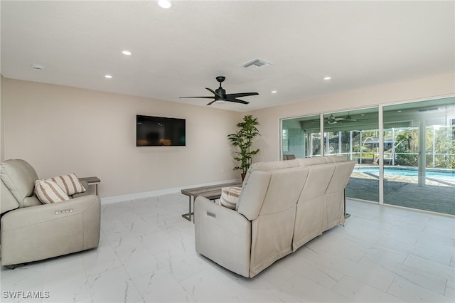 living room featuring ceiling fan