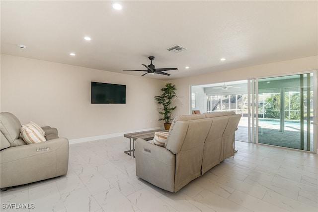 living room featuring ceiling fan