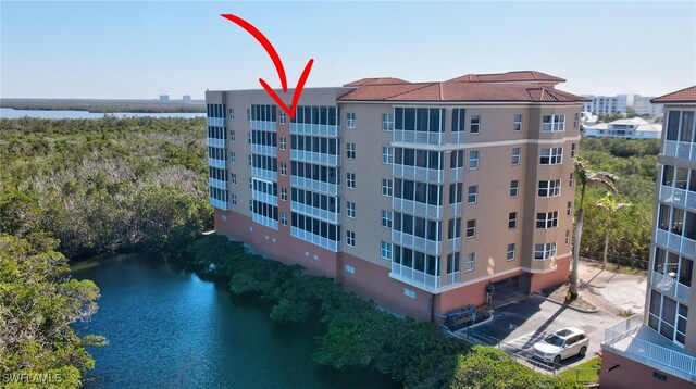 view of property with a water view