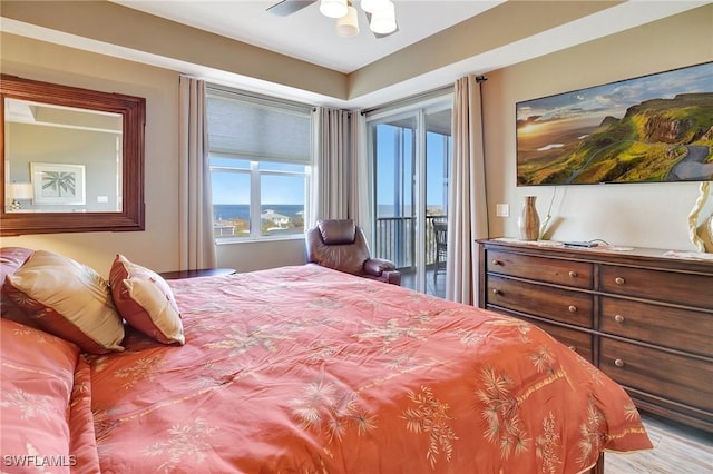 bedroom featuring access to outside and ceiling fan