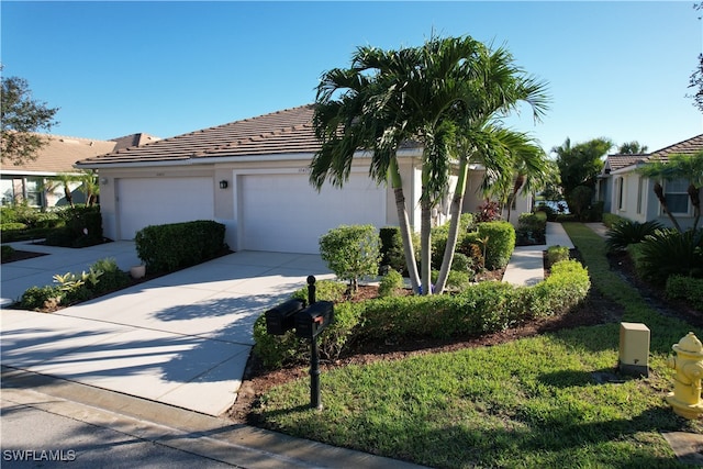 view of front of property featuring a garage