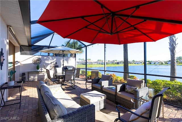 view of patio featuring outdoor lounge area and a water view