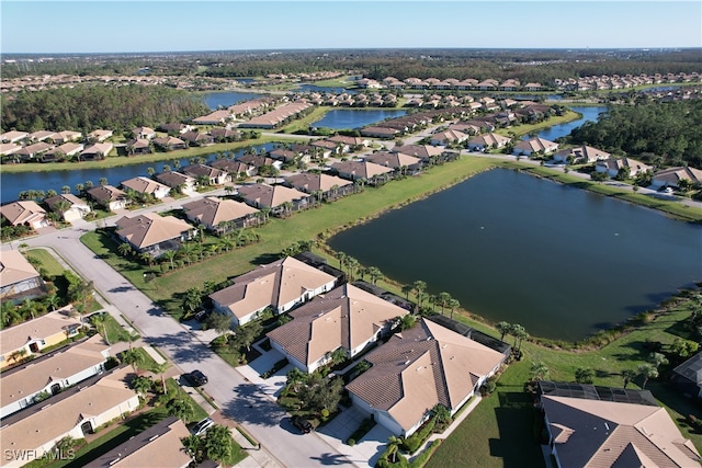 drone / aerial view with a water view