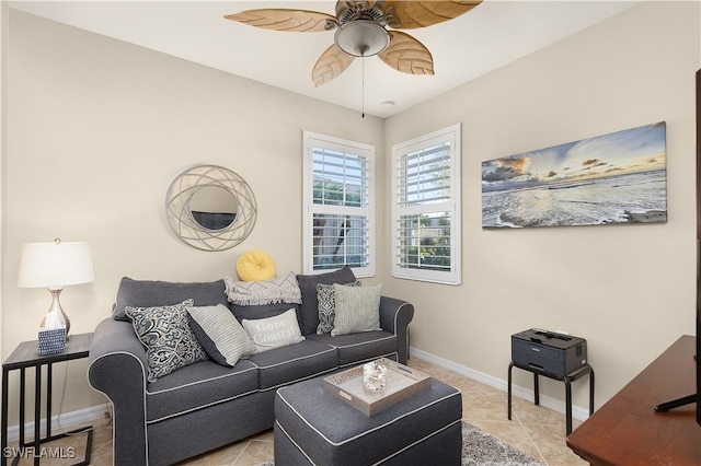 living room with ceiling fan and light tile patterned floors