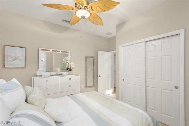 bedroom with a closet and ceiling fan