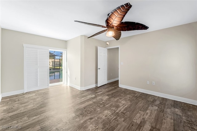 spare room featuring ceiling fan and hardwood / wood-style floors