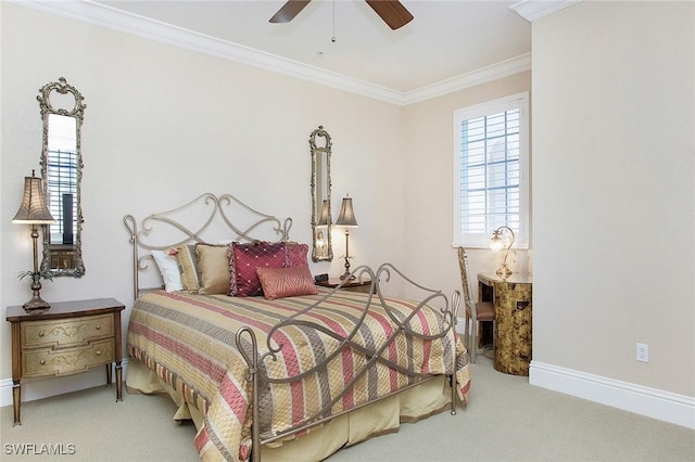 carpeted bedroom with ceiling fan and crown molding