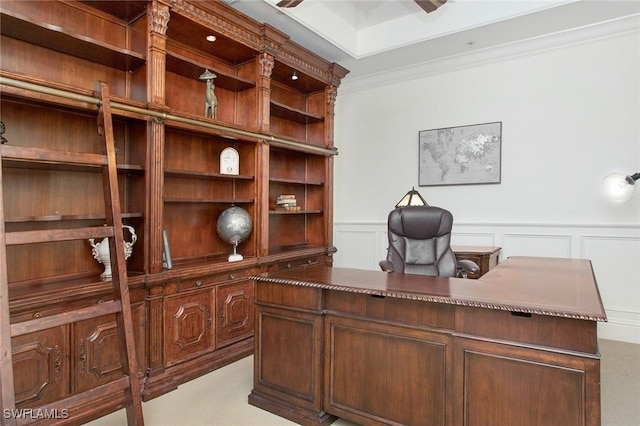 carpeted office with crown molding