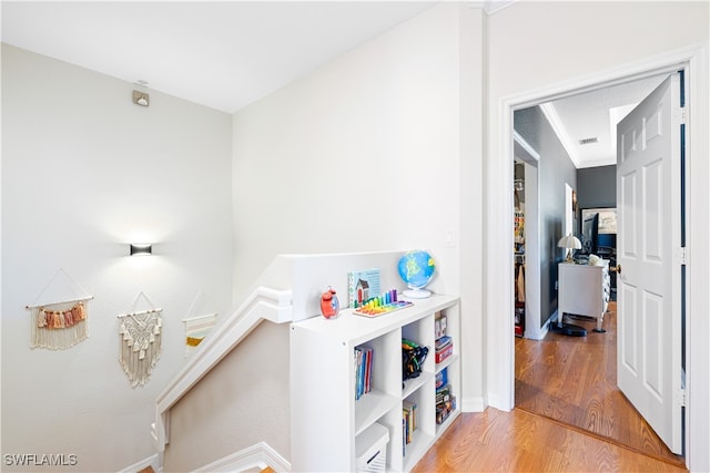 recreation room featuring hardwood / wood-style floors