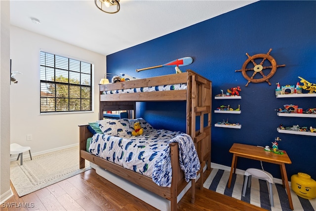 bedroom featuring hardwood / wood-style flooring