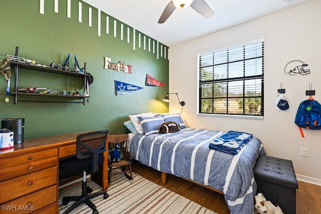 bedroom with hardwood / wood-style floors and ceiling fan