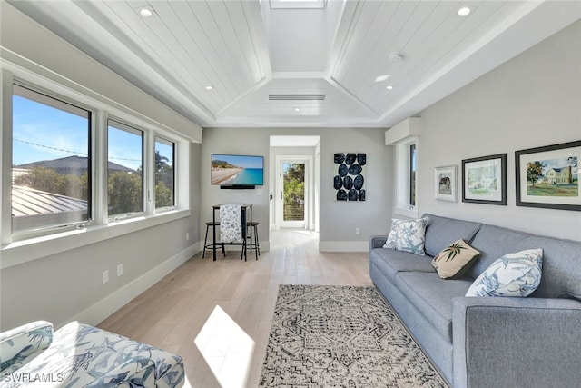 living room with light hardwood / wood-style flooring, lofted ceiling, and wood ceiling