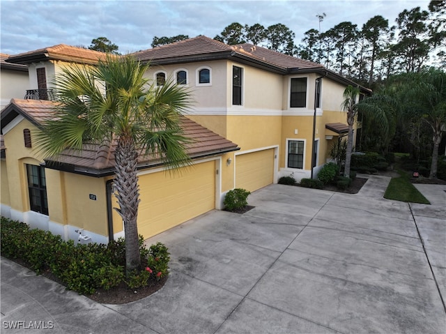 view of front of home with a garage