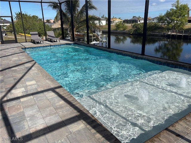 view of swimming pool featuring a water view and glass enclosure