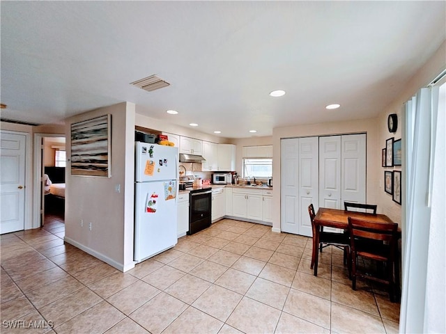 kitchen featuring white cabinetry, white appliances, sink, and light tile patterned floors