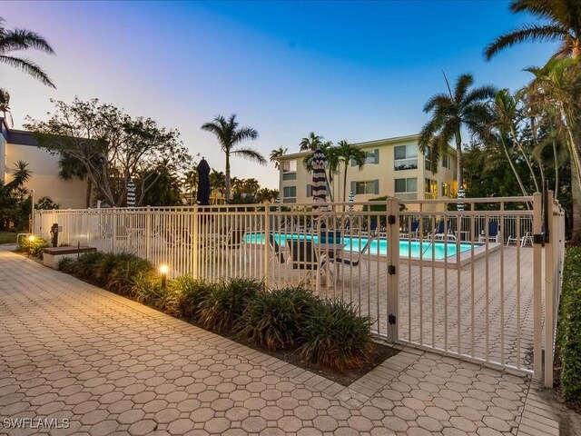 1930 Gulf Shore Blvd N Unit D301, Naples, FL 34102 - community pool featuring a patio area