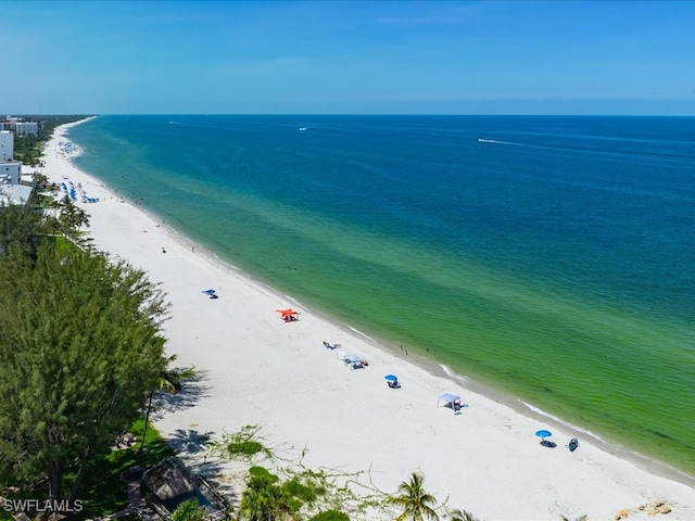 aerial view with a view of the beach and a water view