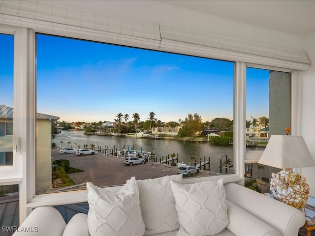 property view of water featuring a boat dock