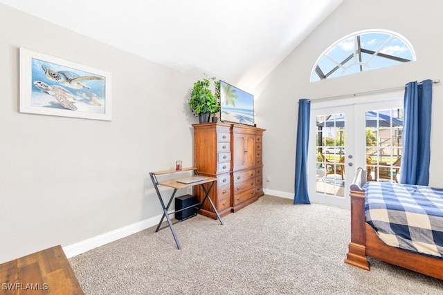 carpeted bedroom featuring french doors, access to outside, and high vaulted ceiling