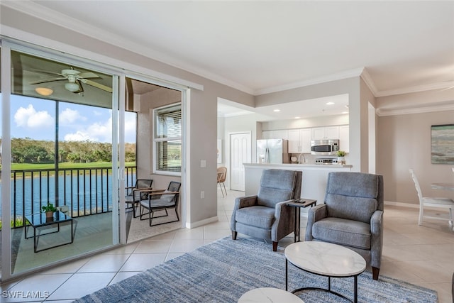 interior space with a water view, ceiling fan, and ornamental molding