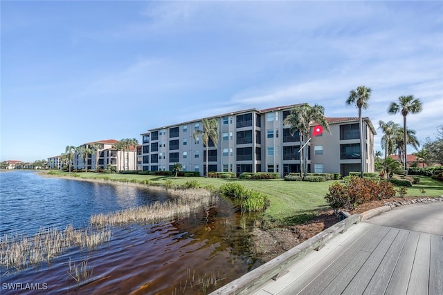 view of building exterior with a water view