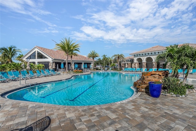 view of swimming pool featuring a patio area