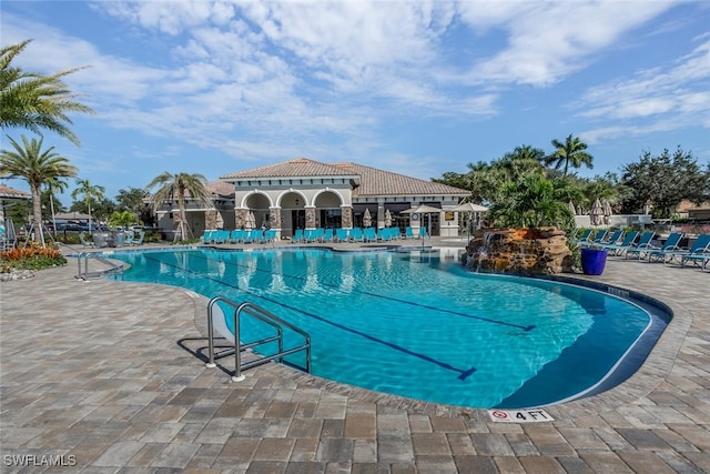 view of swimming pool with a patio area