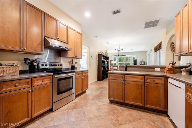 kitchen with stainless steel range with electric stovetop, an inviting chandelier, white dishwasher, sink, and kitchen peninsula