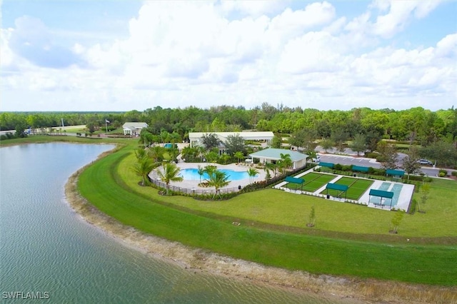 birds eye view of property with a water view