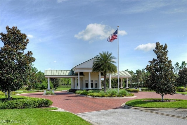 view of community featuring a yard