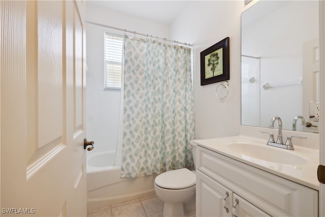 full bathroom featuring toilet, tile patterned floors, vanity, and shower / tub combo with curtain